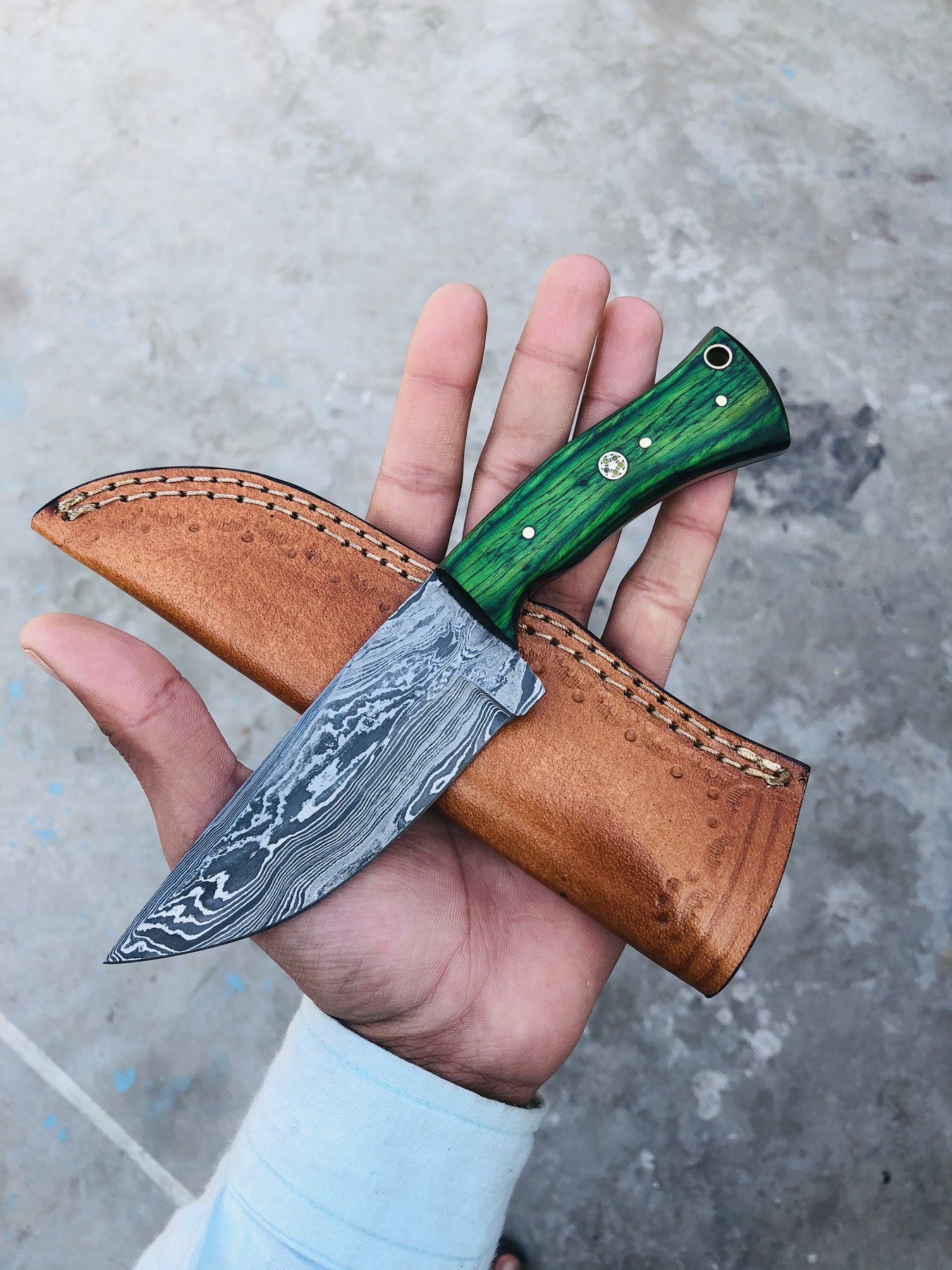 damascus knife with green handle