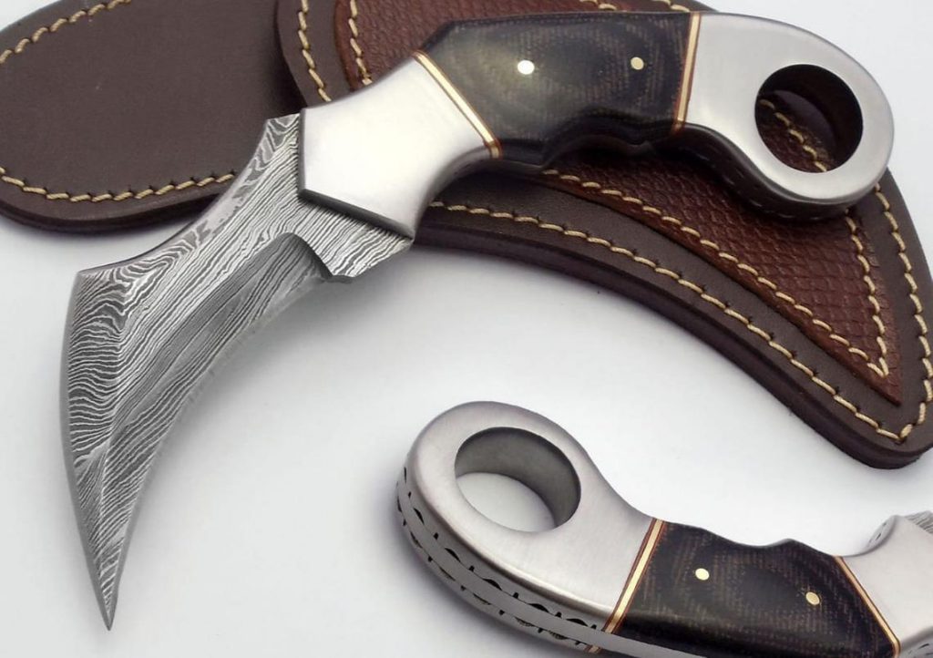 Entirely handmade custom Damascus steel karambit knife
