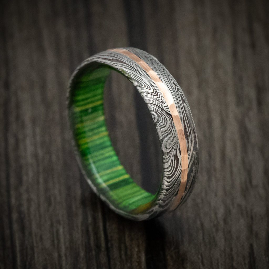 Damascus Steel Ring With Golden Inlay And Wood Sleeve Marble Finish